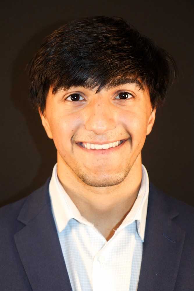 Kyle Ravi Bell's headshot